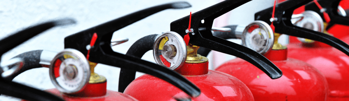 A row of fire extinguishers